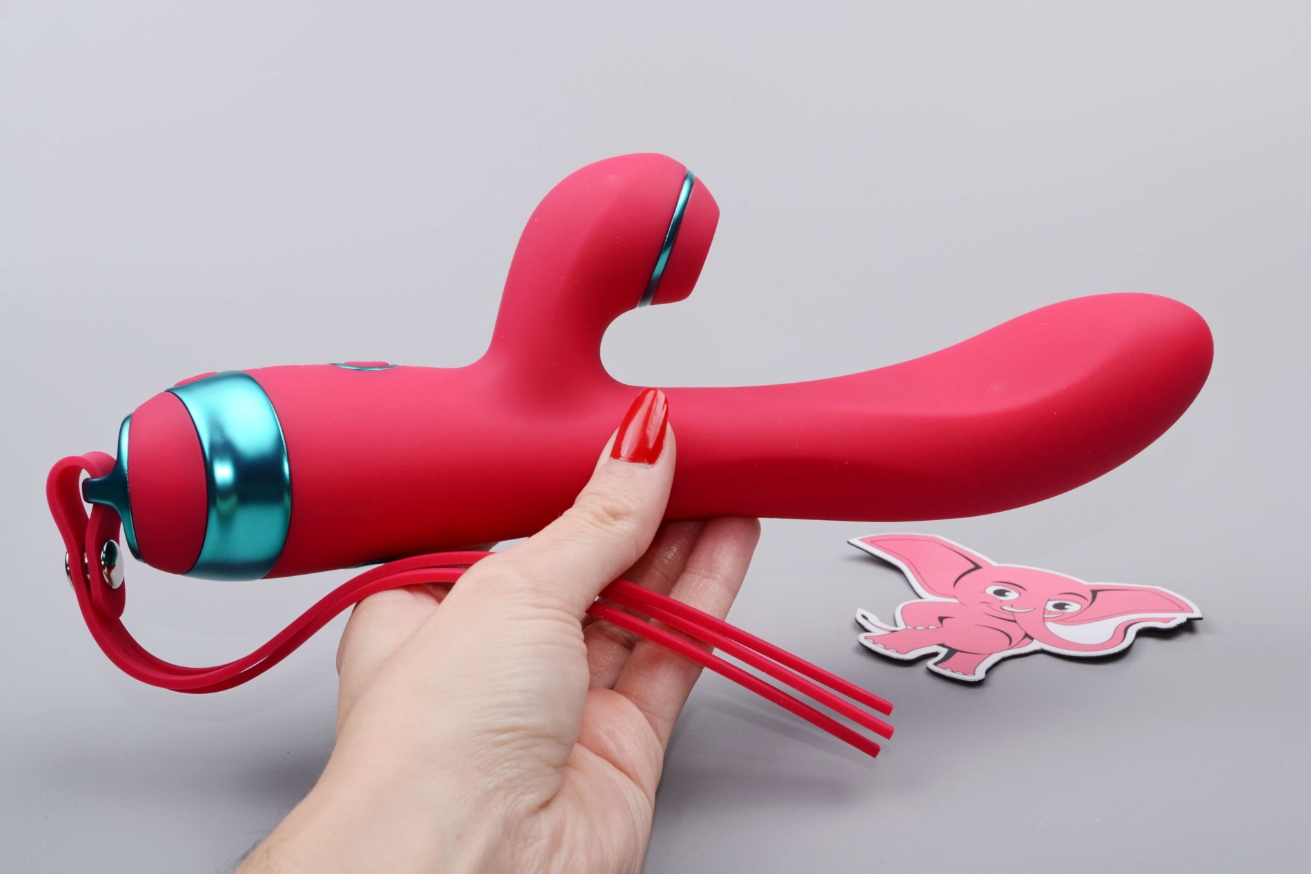 Adore Magenta G Touch tlakový vibrátor (22,8 cm), v ruce