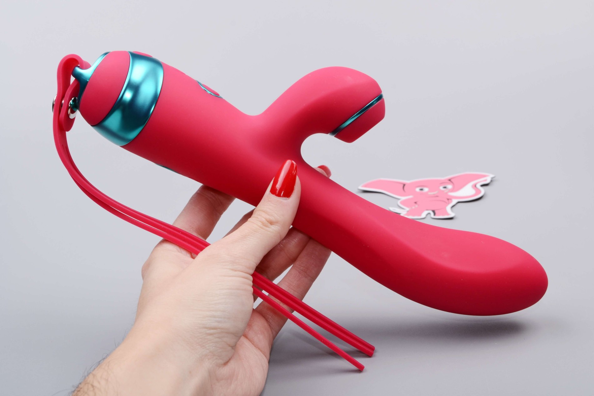 Adore Magenta G Touch tlakový vibrátor (22,8 cm), v ruce