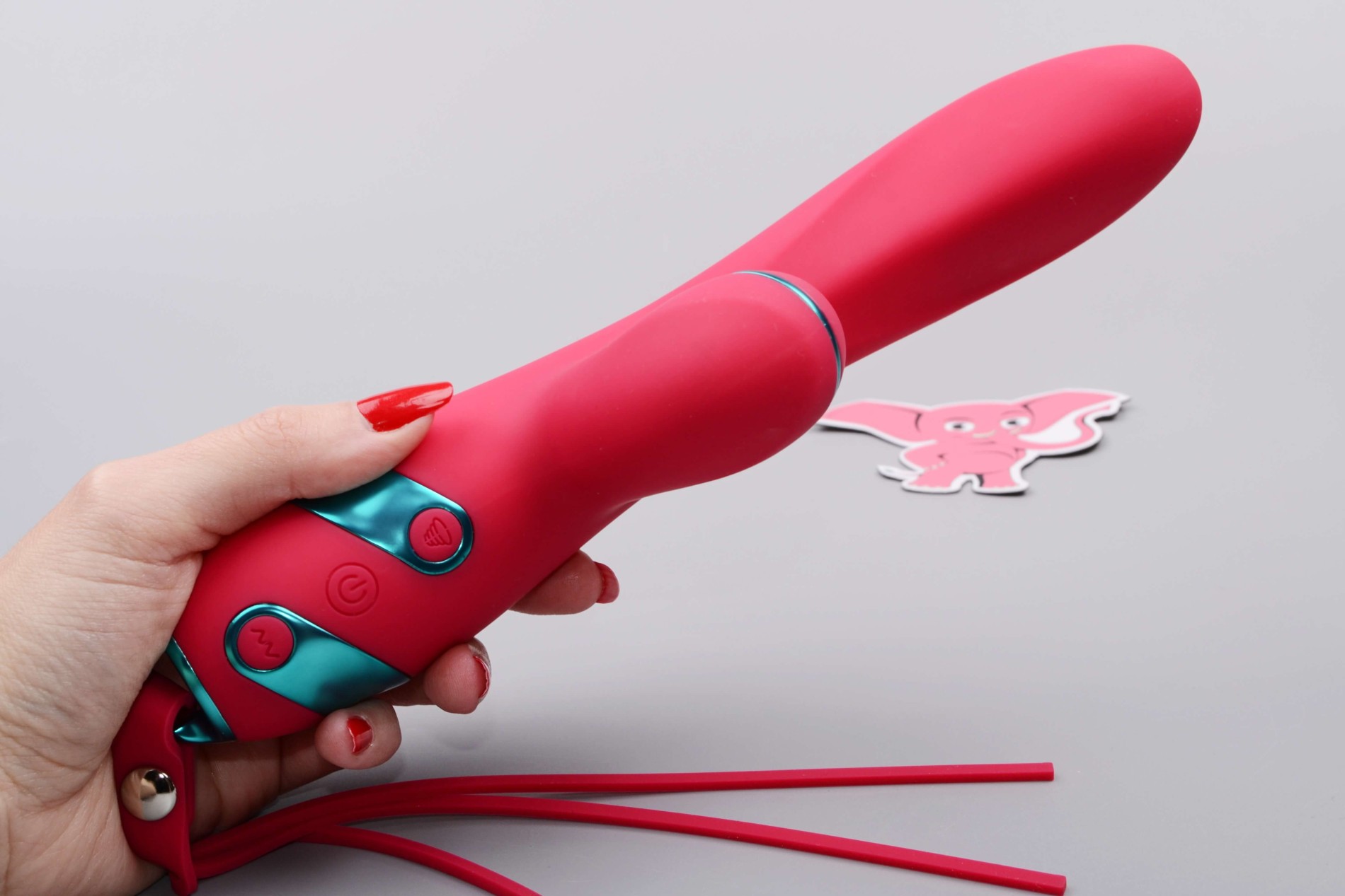 Adore Magenta G Touch tlakový vibrátor (22,8 cm), v ruce