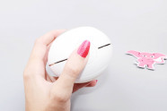 Tenga Flip Hole Zero EV vibrační masturbátor, v ruce