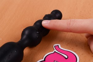 Dvojité dildo Ass Jacker (18 cm) – s ukazujícím prstem